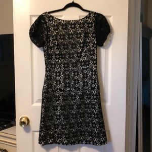 Black dress with cream lining.